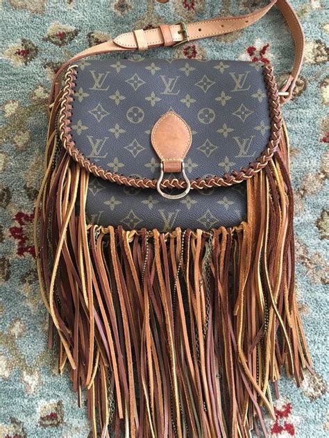 Louis Vuitton purse with fringe